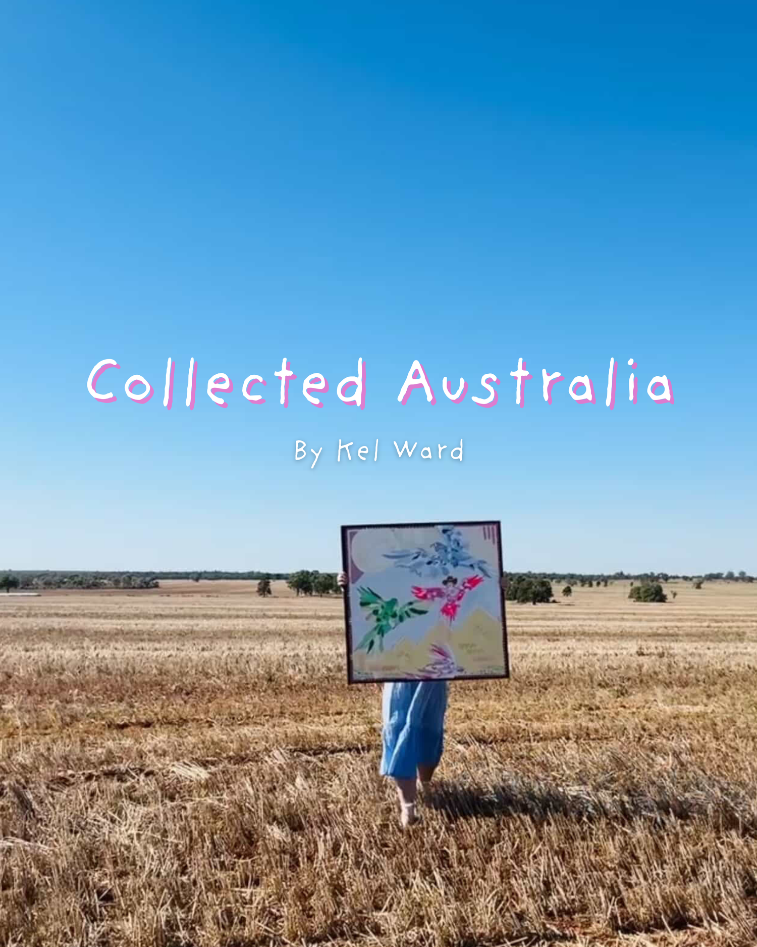 Person holding a framed artwork in a field with 'Collected Australia' text on a blue sky background