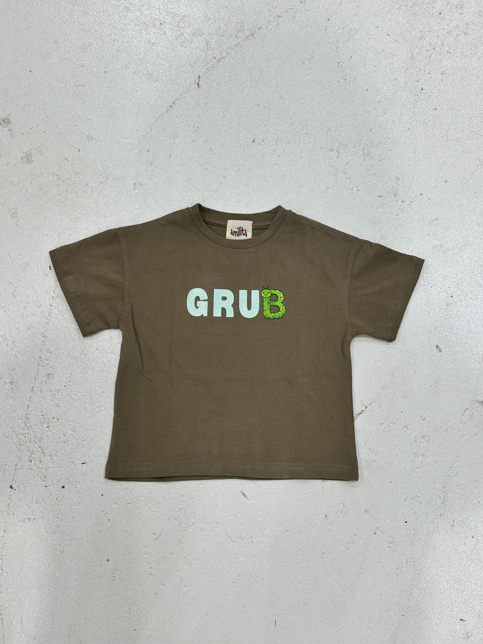 Brown coloured cotton kids tee with blue “grub” text