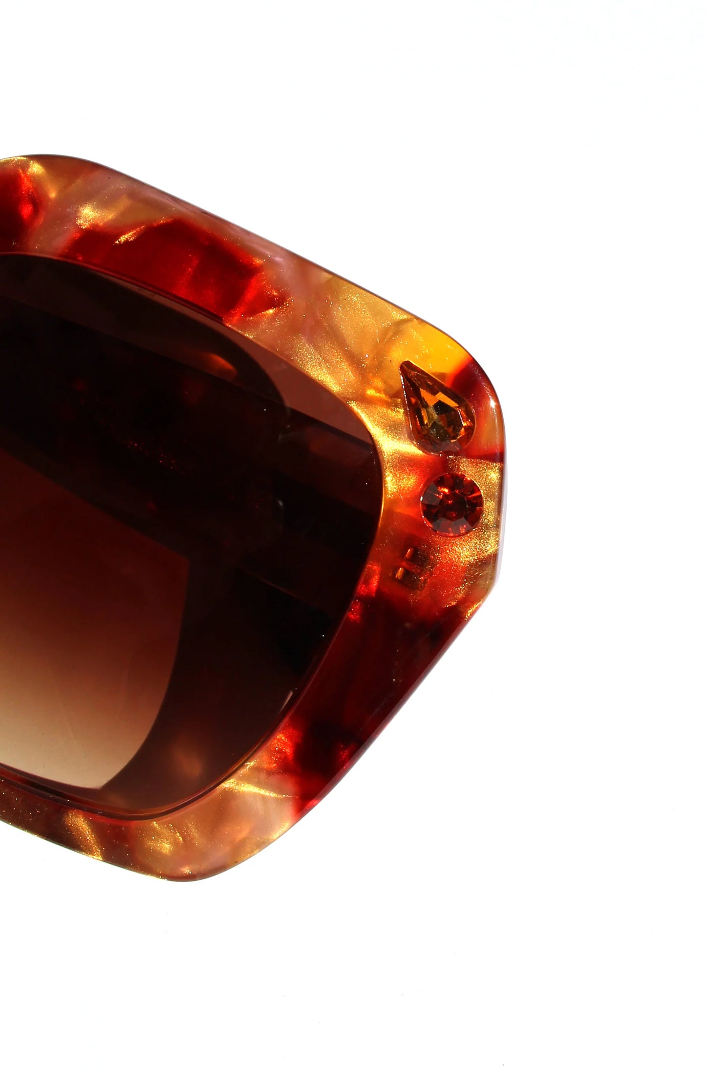 Oversized oval sunglasses in red and apricot tort with crystals