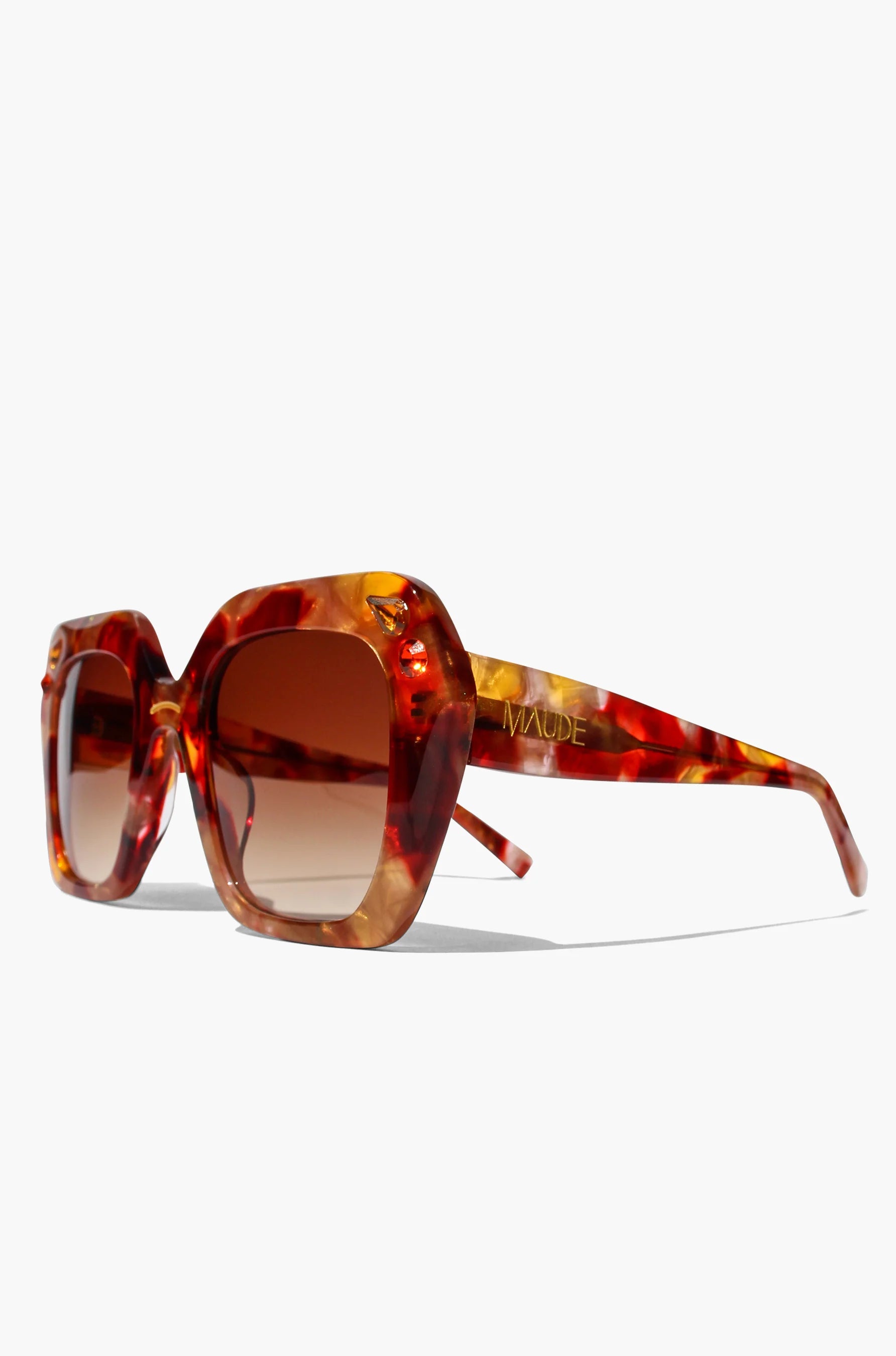Oversized oval sunglasses in red and apricot tort with crystals