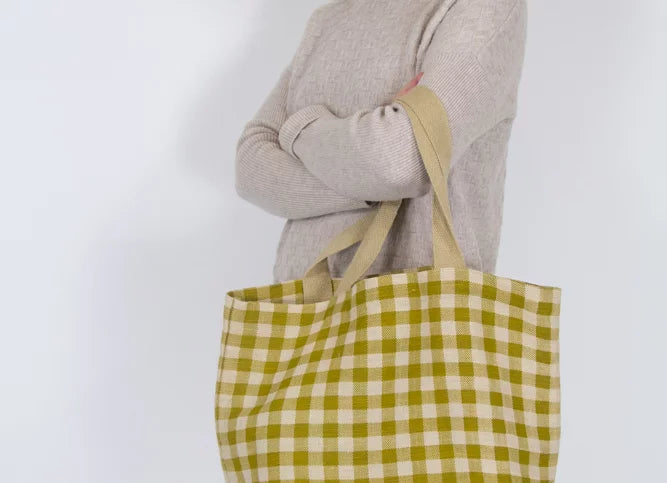 Olive Green & Cream Gingham Tote bag being held